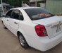 Chevrolet Lacetti MT 2012 - Cần bán Chevrolet Lacetti MT 2012, màu trắng, xe nhập, dàn đồng zin 100%