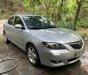 Mazda 3 AT 2004 - Cần bán lại xe Mazda 3 AT sản xuất năm 2004, màu bạc