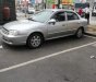 Kia Spectra   2006 - Bán xe Kia Spectra sản xuất năm 2006, màu bạc, xe đồng sơn mới keng