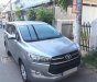 Toyota Innova E 2018 - Bán gấp xe Innova 2018 số sàn màu xám rất mới