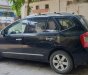 Kia Carens   MT  2011 - Bán xe Kia Carens MT đời 2011, màu đen chính chủ