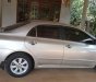 Toyota Corolla altis 2010 - Cần bán lại xe Toyota Corolla Altis năm 2010, màu bạc xe gia đình, giá tốt