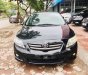 Toyota Corolla altis 2010 - Cần bán Toyota Corolla Altis đời 2010, màu đen