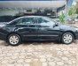 Toyota Corolla altis 2010 - Cần bán Toyota Corolla Altis đời 2010, màu đen