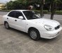 Daewoo Nubira 2003 - Cần bán gấp Daewoo Nubira đời 2003, màu trắng xe gia đình, 90tr