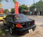 Kia Spectra 2004 - Cần bán lại xe Kia Spectra năm sản xuất 2004, màu đen giá cạnh tranh