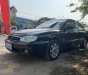 Kia Spectra 2004 - Cần bán lại xe Kia Spectra năm sản xuất 2004, màu đen giá cạnh tranh