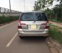 Toyota Innova E 2014 - Cần bán xe Toyota Innova 2.0E SX 2014, lăn bánh 2015 màu cát