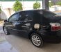 Toyota Vios  E   2010 - Bán xe Toyota Vios E năm 2010, màu đen