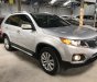 Kia Sorento 2.4MT 2012 - Bán Kia Sorento 2.4MT màu bạc, số sàn, 7 chỗ, máy xăng, sản xuất 2012, full options