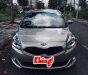 Kia Rondo 2016 - Bán ô tô Kia Rondo sản xuất 2016, màu vàng cát