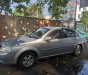 Daewoo Lacetti EX 2009 - Bán ô tô Daewoo Lacetti EX đời 2009, màu bạc chính chủ