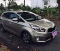 Kia Rondo 2016 - Bán ô tô Kia Rondo sản xuất 2016, màu vàng cát