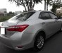 Toyota Corolla altis G 2014 - Bán Toyota Corolla altis G 1.8MT, màu bạc, sx 2014 form mới