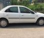 Mazda 323 2000 - Cần bán Mazda 323 đời 2000, màu trắng