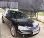 Ford Laser   Ghia   2004 - Cần bán xe Ford Laser Ghia sản xuất năm 2004, màu đen