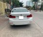 BMW 3 Series 320i 2014 - Cần bán xe BMW 320i 2014 ĐK 2015, số tự động, màu trắng