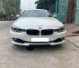 BMW 3 Series 320i 2014 - Cần bán xe BMW 320i 2014 ĐK 2015, số tự động màu trắng