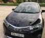 Toyota Corolla altis 2014 - Cần bán xe Toyota Corolla altis sản xuất năm 2014, màu đen