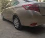 Toyota Vios 2016 - Gia đình cần bán Toyota Vios SX 2016 số tự động, màu vàng cát