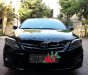 Toyota Corolla altis G 2014 - Bán xe Toyota Corolla Altis G sản xuất năm 2014, màu đen chính chủ, giá 635tr