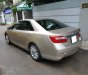 Toyota Camry 2014 - Cần bán xe Toyota Camry 2.5Q 2014 số tự động màu nâu vàng biển số TP