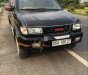 Isuzu Hi lander AT 2004 - Bán lại xe Isuzu Hi lander AT sản xuất năm 2004, màu đen xe gia đình