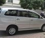 Toyota Innova E 2013 - Bán Toyota Innova E đời 2013, màu bạc còn mới giá cạnh tranh