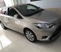 Toyota Vios 2016 - Cần bán xe Toyota Vios 1.5E 2016, số tự động, màu vàng cát