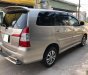 Toyota Innova 2015 - Xe Toyota Innova đời 2015, màu vàng, số sàn, giá 533tr