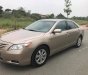 Toyota Camry LE 2.4AT 2007 - Bán gấp xe Toyota Camry LE đời 2007 số tự động, màu nâu vàng