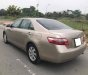 Toyota Camry LE 2007 - Nhà cần tiền bán gấp xe Toyota Camry LE đời 2007 số tự động, màu nâu vàng