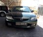 Mazda 323   2002 - Bán Mazda 323 năm sản xuất 2002, màu đen, xe nhập 