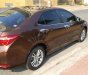 Toyota Corolla altis 2014 - Cần bán xe Toyota Corolla altis năm sản xuất 2014, màu nâu xe gia đình