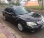 Ford Mondeo   2V  2006 - Bán Ford Mondeo 2V đời 2006, màu đen, xe đang sử dụng không lội nước và cấn mốp