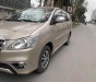 Toyota Innova 2016 - Gia đình cần bán xe Innova 2016, số sàn, màu vàng cát, gia đình sử dụng