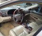 Toyota Camry 2004 - Cần bán gấp Toyota Camry đời 2004, màu xám, số sàn