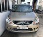 Mitsubishi Zinger GLS 2.4 AT 2009 - Cần bán lại xe Mitsubishi Zinger GLS 2.4 AT năm sản xuất 2009, màu vàng  