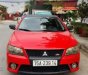 Mitsubishi Lancer    2009 - Bán ô tô Mitsubishi Lancer sản xuất 2009, màu đỏ, xe nhập, 350tr