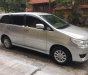 Toyota Innova  2.0E  2014 - Bán chiếc xe Innova 2.0E màu bạc, Sx cuối năm 2014, chính chủ nhà tôi đi từ đầu