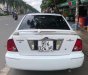 Ford Laser GHIA 1.8 MT 2002 - Cần bán Ford Laser GHIA 1.8 MT năm 2002, màu trắng 