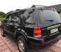 Ford Escape 2.0 2004 - Bán Ford Escape 2.0 MT 2 cầu, màu đen, số sàn