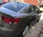 Kia Forte    AT 2011 - Cần bán lại xe Kia Forte AT sản xuất năm 2011, màu xám xe gia đình 