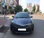 Toyota Corolla altis 2015 - Cần tiền bán xe ô tô Altis 2015, số sàn, màu xanh, nhà dùng rất kỹ nên còn rất mới