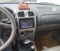 Ford Laser GHIA 1.8 MT 2003 - Bán Ford Laser GHIA 1.8 MT 2003, màu bạc, giá tốt