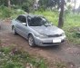 Ford Laser GHIA 1.8 MT 2003 - Bán Ford Laser GHIA 1.8 MT 2003, màu bạc, giá tốt