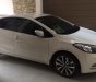 Kia K3 1.6 MT 2015 - Bán Kia K3 1.6 MT 2015, màu trắng, chạy 30.000 km