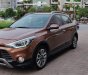 Hyundai i20 Active 1.4 AT 2015 - Cần bán Hyundai i20 Active 1.4 AT sản xuất 2015, màu nâu, xe nhập 