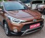 Hyundai i20 Active 1.4 AT 2015 - Cần bán Hyundai i20 Active 1.4 AT sản xuất 2015, màu nâu, xe nhập 