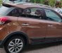 Hyundai i20 Active 1.4 AT 2015 - Cần bán Hyundai i20 Active 1.4 AT sản xuất 2015, màu nâu, xe nhập 